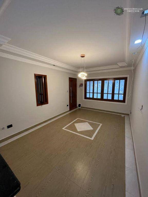 Casa à venda, 127 m² por R$ 590.000,00 - Maracanã - Praia Grande/SP