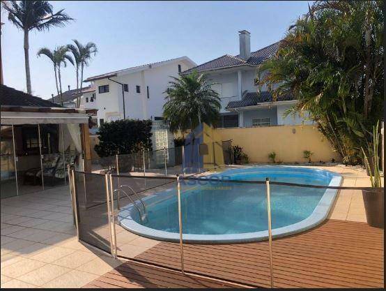 Casa com 4 dormitórios à venda, 400 m² por R$ 3.890.000,00 - Jurerê Internacional - Florianópolis/SC