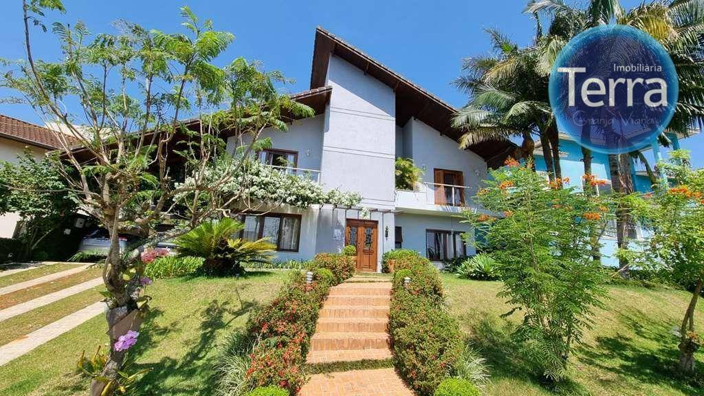 Casa com 4 suítes com lindo jardim, piscina e quintal por R$ 1.900.000 - GRANJA VIANA