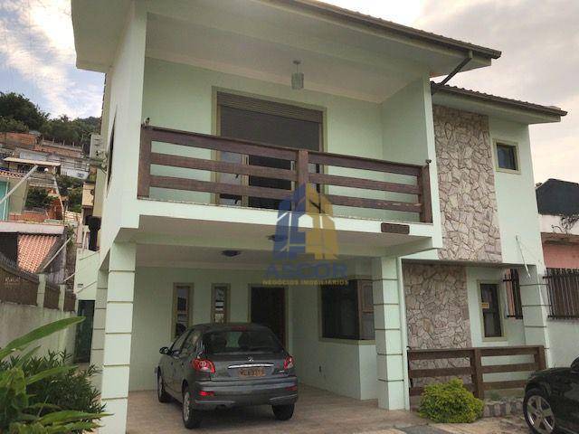 Casa com 4 dormitórios à venda, 212 m² por R$ 1.100.000,00 - Costeira do Pirajubaé - Florianópolis/SC